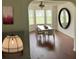 Formal dining room with hardwood floors, large windows, and seating for six at 475 Cascade Rise, South Fulton, GA 30331