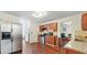 Well-equipped kitchen with stainless steel appliances, wooden cabinets, and granite countertops at 475 Cascade Rise, South Fulton, GA 30331