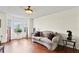 Bright living room featuring hardwood floors, natural light, and stylish furniture at 475 Cascade Rise, South Fulton, GA 30331