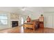 Main bedroom with fireplace, hardwood floors, neutral walls, and vaulted ceilings at 475 Cascade Rise, South Fulton, GA 30331