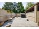 The backyard features a wooden deck with outdoor seating and a grill at 666 Serramonte Drive Dr, Marietta, GA 30068