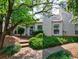 Charming home with a well-manicured front yard and a cozy entrance at 666 Serramonte Drive Dr, Marietta, GA 30068