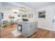 Open kitchen featuring a marble island and hardwood floors at 666 Serramonte Drive Dr, Marietta, GA 30068