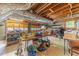 Unfinished basement with exposed wood, shelving, and visible utilities at 2863 Jordan Forest Trl, Lawrenceville, GA 30044