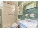 Bathroom featuring a walk-in shower, modern vanity, and storage at 2863 Jordan Forest Trl, Lawrenceville, GA 30044