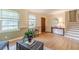 Inviting entryway with hardwood floors, natural light, stairs to the second level, and stylish decor at 2863 Jordan Forest Trl, Lawrenceville, GA 30044