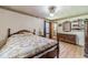 Bedroom featuring hardwood floors, a queen size bed, and closet at 2863 Jordan Forest Trl, Lawrenceville, GA 30044
