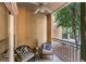 Relaxing balcony with outdoor seating and a view of lush greenery at 3777 Peachtree Ne Rd # 1313, Brookhaven, GA 30319