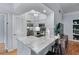 Well-lit kitchen with stainless appliances, marble countertops, and a breakfast bar with seating at 3777 Peachtree Ne Rd # 1313, Brookhaven, GA 30319