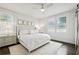 Bright bedroom with large windows, ceiling fan, and stylish decor at 68 Peachtree Memorial Nw Dr # 68-1, Atlanta, GA 30309