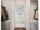 Hallway leading to a bathroom featuring closet space on either side at 68 Peachtree Memorial Nw Dr # 68-1, Atlanta, GA 30309