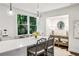 Bright eat-in kitchen with stainless appliances, quartz counters, and pendant lighting at 68 Peachtree Memorial Nw Dr # 68-1, Atlanta, GA 30309