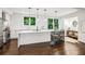Bright kitchen with a large island, stainless steel appliances, and lots of natural light at 68 Peachtree Memorial Nw Dr # 68-1, Atlanta, GA 30309