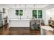Bright kitchen with a large island, stainless steel appliances, and lots of natural light at 68 Peachtree Memorial Nw Dr # 68-1, Atlanta, GA 30309