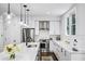 Modern kitchen with stainless steel appliances, white countertops, and stylish pendant lighting at 68 Peachtree Memorial Nw Dr # 68-1, Atlanta, GA 30309