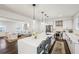 Open-concept kitchen and living room with modern finishes and stainless steel appliances at 68 Peachtree Memorial Nw Dr # 68-1, Atlanta, GA 30309