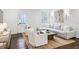 Bright living room with hardwood floors, comfortable seating, and lots of natural light at 68 Peachtree Memorial Nw Dr # 68-1, Atlanta, GA 30309
