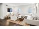 Bright living room with hardwood floors, comfortable seating, and lots of natural light at 68 Peachtree Memorial Nw Dr # 68-1, Atlanta, GA 30309