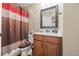 Bathroom featuring vanity with cabinet and a shower/tub combo at 8920 Ellesmere Dr, Cumming, GA 30041