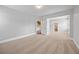 Bright and spacious bedroom with neutral carpet, offering a versatile living space for relaxation and personalization at 8920 Ellesmere Dr, Cumming, GA 30041