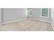 Spacious bedroom with neutral carpet, offering a blank canvas for personalization and relaxation at 8920 Ellesmere Dr, Cumming, GA 30041