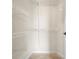 Walk-in closet with wire shelving and carpeted flooring for efficient storage at 8920 Ellesmere Dr, Cumming, GA 30041