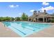 The sparkling community pool invites residents to relax and enjoy the sunny weather at 8920 Ellesmere Dr, Cumming, GA 30041