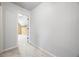 The hallway leads to a large walk-in closet with wall-mounted shelving at 8920 Ellesmere Dr, Cumming, GA 30041