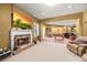 Finished basement with a stone fireplace, entertainment area, bar, and game area at 8920 Ellesmere Dr, Cumming, GA 30041