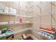 Walk-in pantry with organized wire shelving for ample storage space at 8920 Ellesmere Dr, Cumming, GA 30041