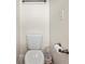 Shot of toilet and the surrounding walls with toilet paper holder at 8920 Ellesmere Dr, Cumming, GA 30041