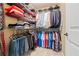 A generously sized walk-in closet featuring extensive shelving and hanging space for optimal organization at 8920 Ellesmere Dr, Cumming, GA 30041