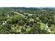 Panoramic aerial view of a residential area, showcasing lush greenery and neighborhood streets at 132 Bishop Nw Rd, Cartersville, GA 30121