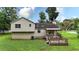 Expansive backyard featuring a deck, offering a serene outdoor living space at 132 Bishop Nw Rd, Cartersville, GA 30121