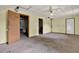 Spacious unfinished basement with concrete flooring and yellow paneled walls at 132 Bishop Nw Rd, Cartersville, GA 30121