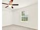 Bedroom featuring a ceiling fan, window with blinds, and closet with shelving at 132 Bishop Nw Rd, Cartersville, GA 30121