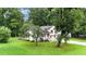 Charming split-level home nestled in a serene wooded area, with a spacious lawn at 132 Bishop Nw Rd, Cartersville, GA 30121