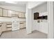 Bright kitchen including walk-in pantry and all white appliances at 132 Bishop Nw Rd, Cartersville, GA 30121