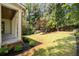 Well-maintained backyard with lush lawn and mature landscaping, offering privacy and tranquility at 3292 Lenox Ne Pl, Atlanta, GA 30324