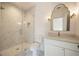Bathroom featuring a glass-enclosed shower, vanity, and stylish finishes at 3292 Lenox Ne Pl, Atlanta, GA 30324