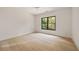 Bright, empty bedroom with hardwood floors and a large window offering ample natural light at 3292 Lenox Ne Pl, Atlanta, GA 30324