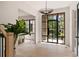 Bright foyer with light wood floors, large windows and views into the yard at 3292 Lenox Ne Pl, Atlanta, GA 30324
