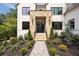 Gorgeous stone front entrance with professionally landscaped walkway and well-maintained bushes at 3292 Lenox Ne Pl, Atlanta, GA 30324