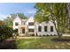 Stunning two-story home with a stone entryway and professionally landscaped front yard at 3292 Lenox Ne Pl, Atlanta, GA 30324