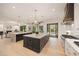 Spacious kitchen connects to the living area and offers an outdoor view through a door at 3292 Lenox Ne Pl, Atlanta, GA 30324