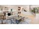 Open concept living room with hardwood floors, bright kitchen and natural light at 3292 Lenox Ne Pl, Atlanta, GA 30324