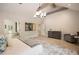Serene main bedroom featuring vaulted ceilings, hardwood floors, and a view to the main bath at 3292 Lenox Ne Pl, Atlanta, GA 30324