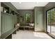 Stylish mudroom with built-in shelving, bench seating, and natural light at 3292 Lenox Ne Pl, Atlanta, GA 30324