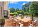 Spacious wooden deck is perfect for outdoor dining and entertaining at 4837 Mystere Sw Cir, Lilburn, GA 30047