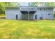 Large backyard with a deck and walkout basement doors, perfect for outdoor activities and entertaining at 6662 Birchwood Ct, Winston, GA 30187